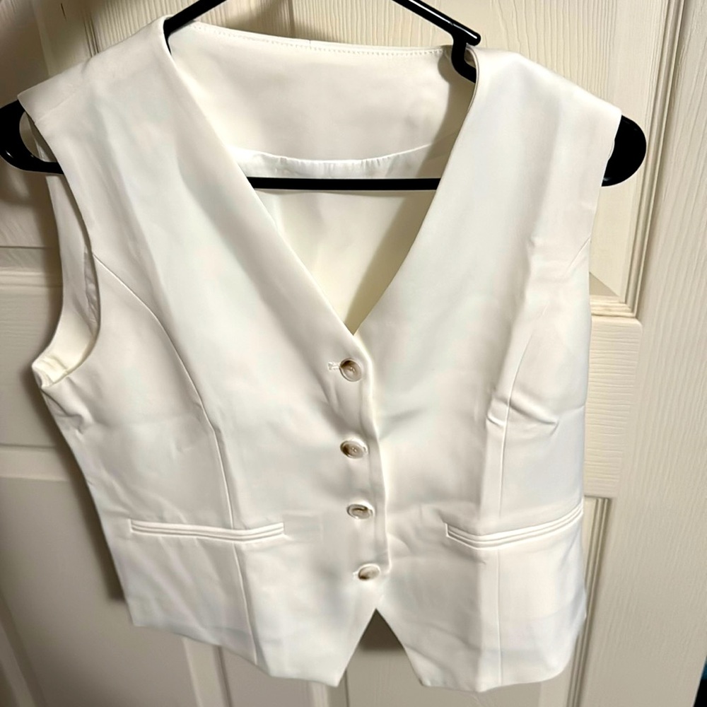 White button-up vest